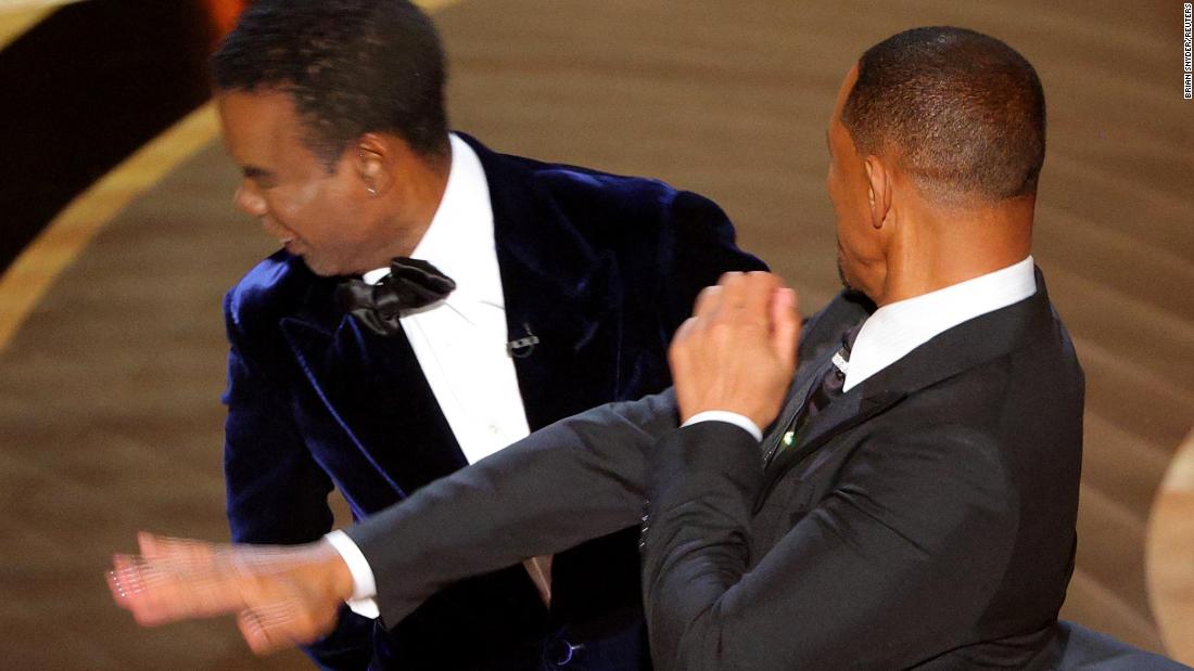Photo of Wie ein Oscar-Fotograf den Moment festhielt, in dem Will Smith Chris Rock eine Ohrfeige verpasste