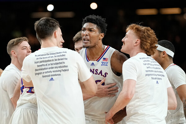 David McCormack, center, celebrating with his Kansas teammates as they take a strong lead against Villanova in their N.C.A.A. tournament semifinal.