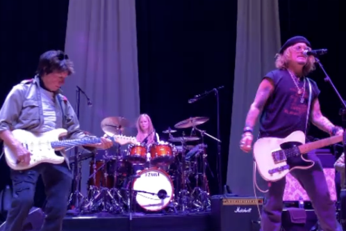 Johnny Depp rocks out with Jeff Beck at Sheffield City Hall in England.