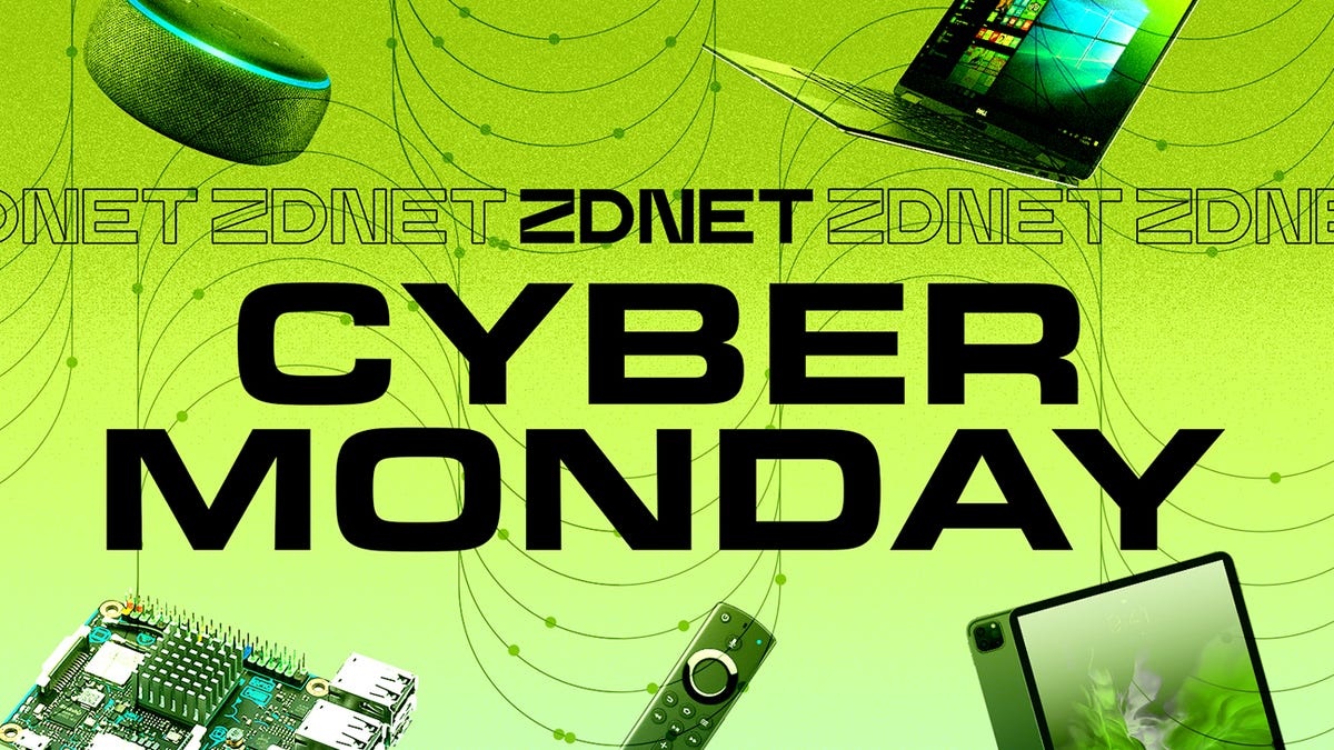 Großer weißer Cyber ​​​​Monday-Text mit elektronischen Geräten dahinter